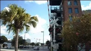 Amtrak Train And Malfunctioning Railroad Crossing