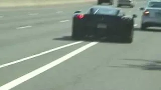 Black Ferrari Enzo on the Highway