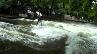 River Surfing on the Eisbach.  English Garden in Munich Germany.