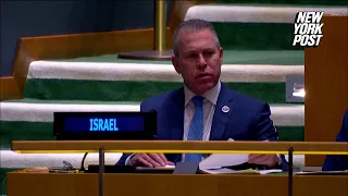 Israeli Ambassador holds up poster w/ Hamas’ number, urges UN members to call it for real ceasefire