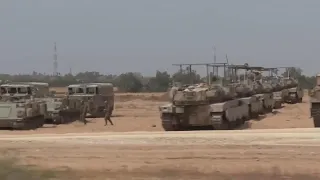 Israel amasses dozens of tanks, armored vehicles along border with southern Gaza Strip