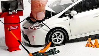 CHANGING TYRES OF MINIATURE TOYOTA PRIUS DEICAST CAR MODEL BY CREATOR JAWAD AHMED