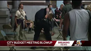 Chaotic scene erupts at City Hall public comment; 2 removed in handcuffs