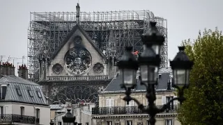 French President Emmanuel Macron vows to rebuild Notre Dame after massive fire