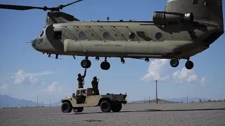 US ARMY CH47F Chinook sling loads Humvee in Fort Bliss