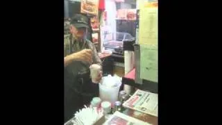 Ray from Ray's Candy Store on Ave A in NYC making an egg cream