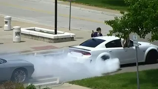 Drivers do 'Burnouts' outside police station in Dearborn