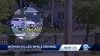 Woman shot, killed while driving