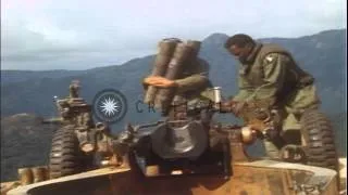 Artillery crew work and men at the M114 155 mm howitzer on Fire Support Base Ripc...HD Stock Footage