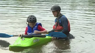 Parents have safety lessons with kids on the Potomac River