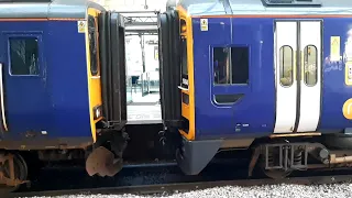 Class 158 couples up to class 156 at Newcastle Central.