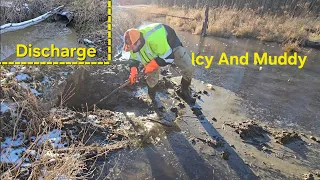 Unclogging Culvert Frozen Shut With Stinky Muck