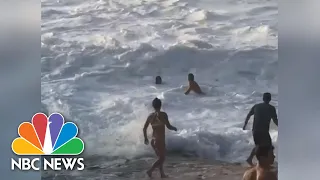 Watch Australian Surfers Save Woman Drowning In Hawaii | NBC News