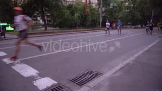 a Lot of People Run Past the Camera