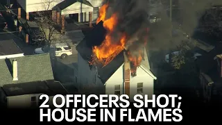 Officers shot responding to call of child shot in East Lansdowne, PA; burning home surrounded