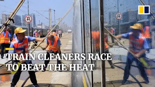 Train sanitising workers in Beijing race against the clock to beat scorching summer heat