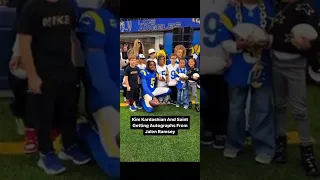 Kim Kardashian takes Saint West to Rams game and Jalen Ramsey gives him an autograph.