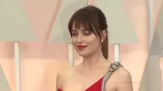 Oscars 2015 - Dakota Johnson posing on the red carpet #1