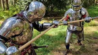 Medieval Armoured Knight Fight with brutal ending! Hema harnischfechten poleaxe duel short movie.