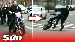 Embarrassing moment NYC cop falls off dirt bike