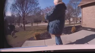Woman shoots neighbor's dog on surveillance video