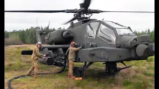 AH-64 APACHE Attack Helicopters conduct HOT REFUELING in the field