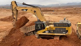 Caterpillar 365C Excavator Loading Mercedes And Man Trucks