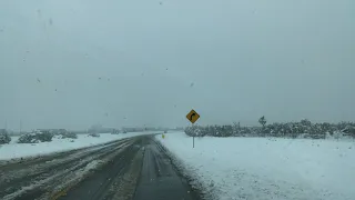 Snow on the 15 freeway and cajon pass VVNG.com