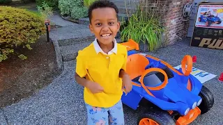 Azu Enjoying his Ride On Hot Wheels car at Night.