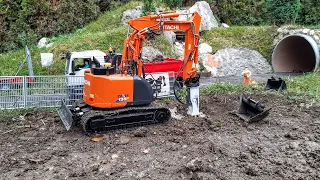 RC Excavator V-Ditch trenching for drainage tube. Hitachi ZX135US, CAT 297D Compact loader