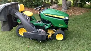 My John Deere x380 lawn tractor with the power mulcher & power flow bagger!