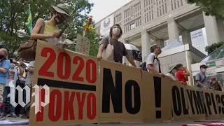 Protesters in Tokyo march on Olympic Opening Ceremonies