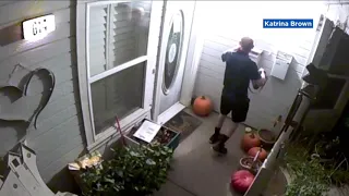 Mystery man caught on camera returning woman's purse on Halloween