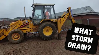 What Storm Drain?: JCB 3CX Backhoe at Work