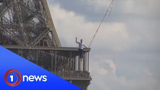 French daredevil stuns crowd with Eiffel Tower highwire act