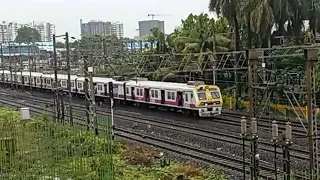 Mumbai Local Train Moving from the Flyover Bridge Crossing Speed Locals at Western Line