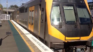Sydney Trains M-set [M29] departing Carlingford