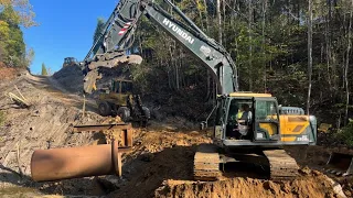 Installing The Overflow And Rock On The Abandon Quarry Dam