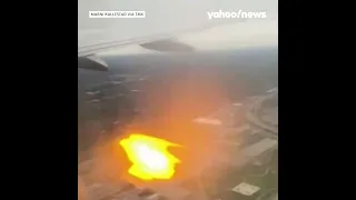 Flames shoot out of airplane engine after apparent bird strike #shorts
