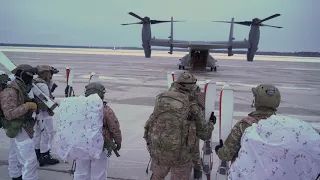USAF CV-22 Osprey delivers US Navy SEALs
