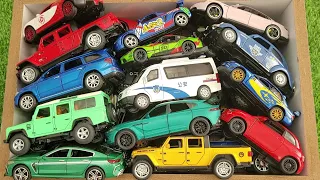 Box full off model cars,Jeep Gladiator,toyota sport,Bugatti vayron,Aston Martin,fiat,benze GL500