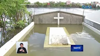 Ilang sementeryo, binaha dahil sa Bagyong Paeng | Saksi