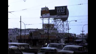 1966 Winter in the city, billboards, neon lights, and driving around, Winnipeg, Manitoba