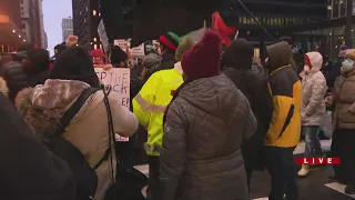 Activists assemble, march downtown in protest of Van Dyke release