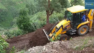 JCB Backhoe Loader-Grading a Hilly Turn-Hilly Road Construction