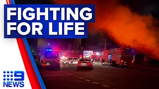 Two firefighters in hospital, one fighting for life after Queensland fire | 9 News Australia