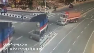 Caught On Camera: Car Crushed Between Two Speeding Trucks