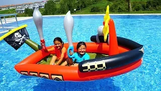 Masal and Öykü play with Giant Inflatable Pirate Ship - Fun Kids Video