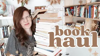 FEBRUARY BOOK HAUL - where the stack is so big books are falling off
