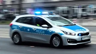 KIA police cars responding on lights and sirens in Warsaw